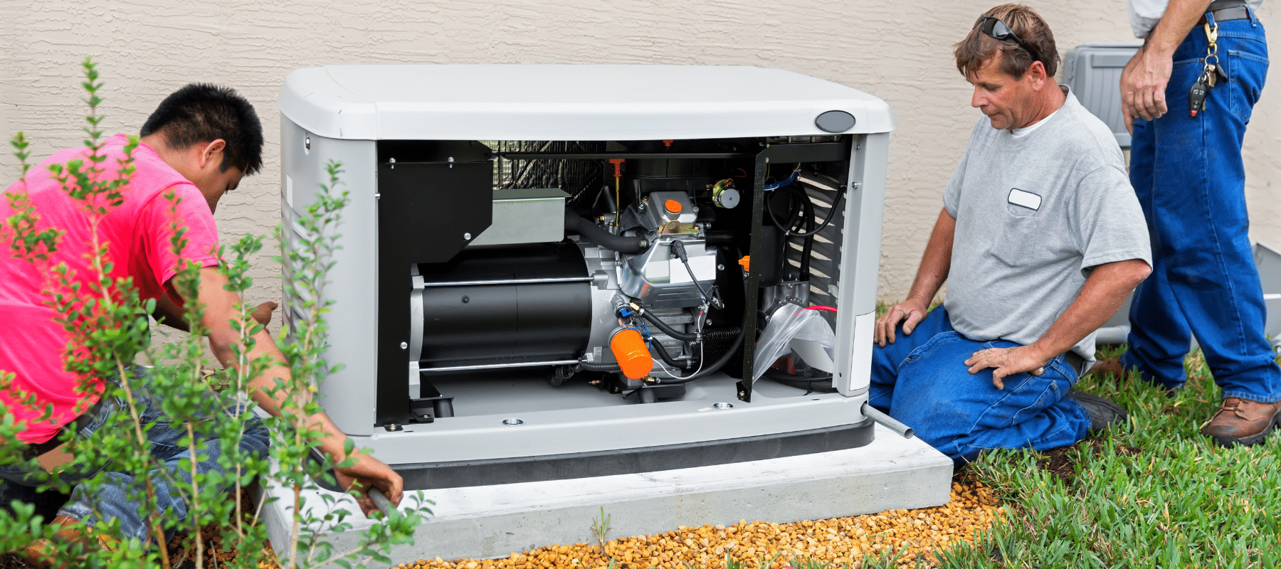 technicians installing a generator